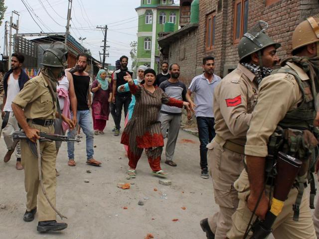 Kashmiris protest as police carry away the body of a youth from outside a hospital in Srinagar. (AFP Photo) Kashmiris protest as police carry away the body of a youth from outside a hospital in Srinagar. (AFP Photo)