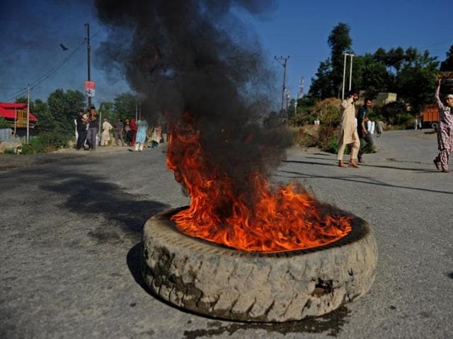 Kashmir Valley witnessed violence on Saturday, July 9, 2016, in the aftermath of the death of Burhan Wani, the top commander of militant organisation Hizbul Mujahideen. (AFP Photo) Kashmir Valley witnessed violence on Saturday, July 9, 2016, in the aftermath of the death of Burhan Wani, the top commander of militant organisation Hizbul Mujahideen. (AFP Photo)