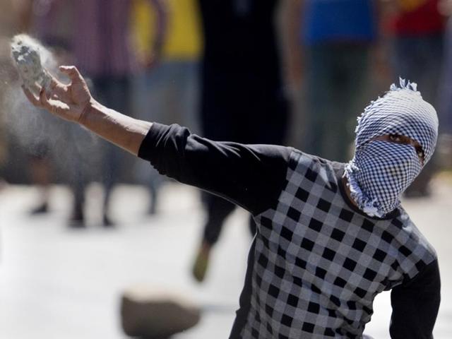 Kashmir Valley witnessed violence on Saturday, July 9, 2016, in the aftermath of the death of Burhan Wani, the top commander of militant organisation Hizbul Mujahideen. (Waseem Andrabi / HT Photo) Kashmir Valley witnessed violence on Saturday, July 9, 2016, in the aftermath of the death of Burhan Wani, the top commander of militant organisation Hizbul Mujahideen. (Waseem Andrabi / HT Photo)