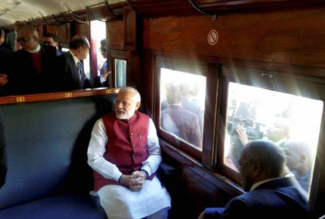 Prime Minister Narendra Modi travels from Pentrich railway station to Pietermaritzburg, South Africa on Saturday. (PTI Photo)