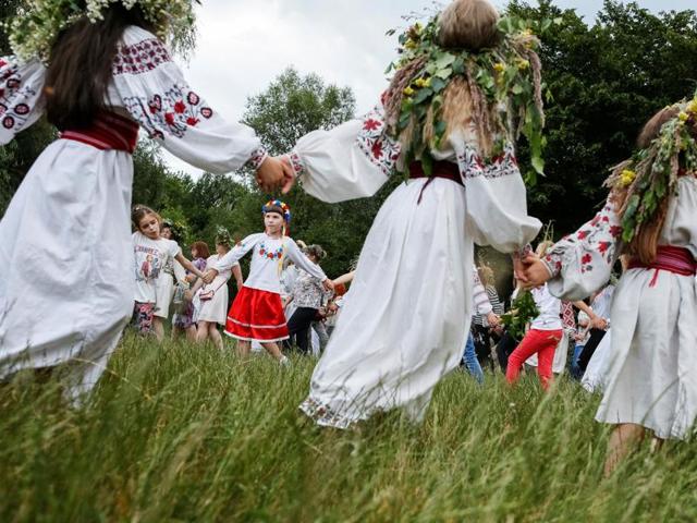 Children take part in a celebration on the traditional Ivana Kupala. (REUTERS) Children take part in a celebration on the traditional Ivana Kupala. (REUTERS)