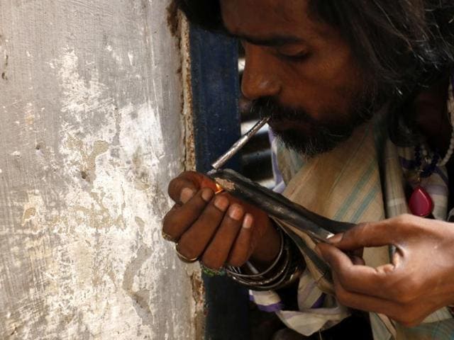 Pack that smack: An addict smokes inferior quality heroin on a street in Ajmer, Rajasthan. (Getty Images) Pack that smack: An addict smokes inferior quality heroin on a street in Ajmer, Rajasthan. (Getty Images)