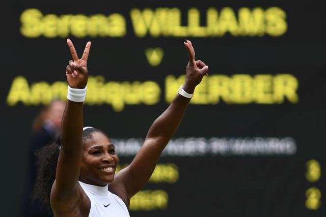 Serena lifts two fingers on each hand to indicate her 22 Grand Slams after her win over Kerber. (AFP) Serena lifts two fingers on each hand to indicate her 22 Grand Slams after her win over Kerber. (AFP)