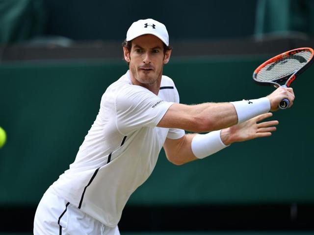 Britain's Andy Murray returns against Czech Republic's Tomas Berdych in their men's singles semifinal. (AFP Photo) 