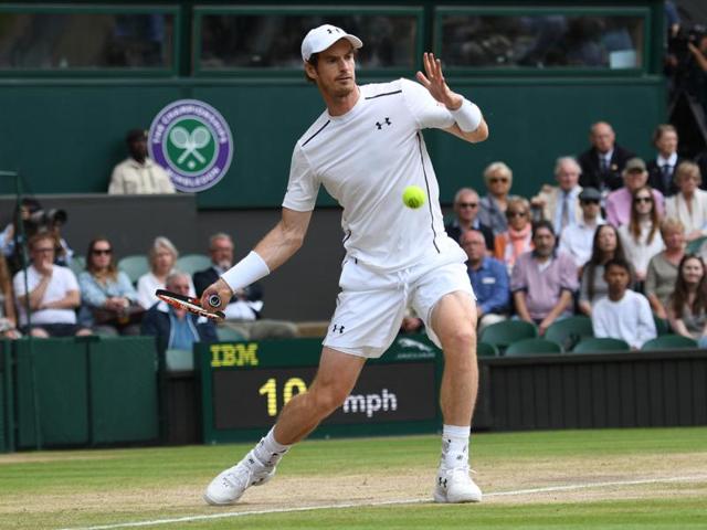 Britain's Andy Murray returns against Czech Republic's Tomas Berdych in their men's singles semifinal match. (AFP) 