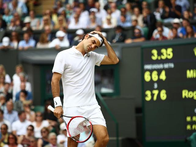 Switzerland's Roger Federer reacts after losing a point to Canada's Milos Raonic during their men's semifinal . (AFP Photo) Switzerland's Roger Federer reacts after losing a point to Canada's Milos Raonic during their men's semifinal . (AFP Photo)