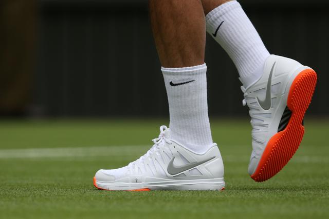 Roger Federer was banned from wearing orange-soled shoes in 2014. (Getty Images)