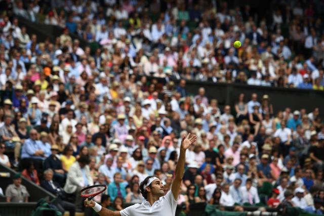 Switzerland's Roger Federer serves to Canada's Milos Raonic. (AFP Photo) Switzerland's Roger Federer serves to Canada's Milos Raonic. (AFP Photo)
