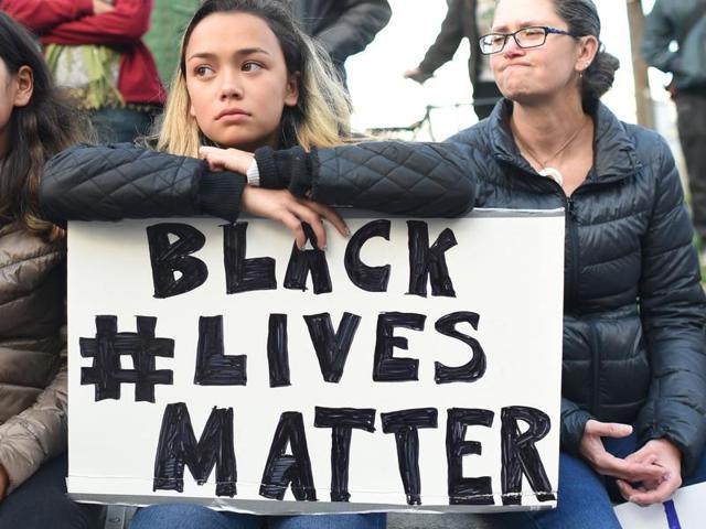 People take part in a rally for the Black Lives Matter movement at Justin Herman Plaza in San Francisco. (AFP) People take part in a rally for the Black Lives Matter movement at Justin Herman Plaza in San Francisco. (AFP)