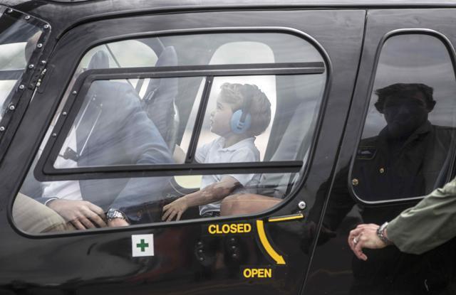 Prince George sits in the back seat of a "Squirrel" helicopter similar to the one that his father Prince william trained on as he visits the Royal international air tattoo at RAF Fairford, Britain. (Reuters) Prince George sits in the back seat of a "Squirrel" helicopter similar to the one that his father Prince william trained on as he visits the Royal international air tattoo at RAF Fairford, Britain. (Reuters)