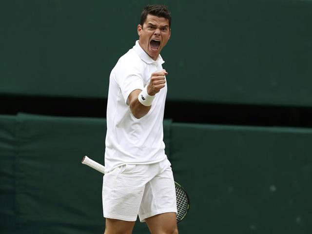 Milos Raonic celebrates during his match against Switzerland's Roger Federer. (REUTERS) 