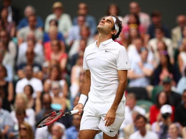 witzerland's Roger Federer reacts during his match against Canada's Milos Raonic. (Reuters) 