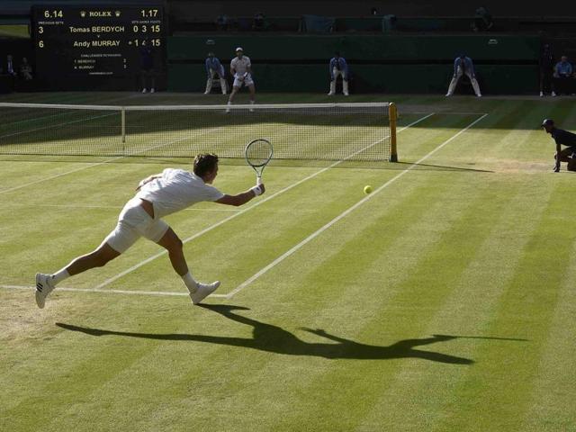 Czech Republic's Tomas Berdych in action against Great Britain's Andy Murray. (REUTERS) 