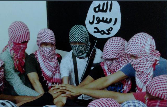 A photo from IS magazine Dabiq showing purported Bangladeshi fighters A photo from IS magazine Dabiq showing purported Bangladeshi fighters
