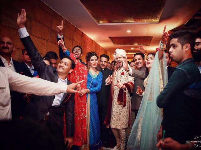 An Indian wedding is never complete without the ‘baarat’ dance. (Facebook/TheWeddingStory)