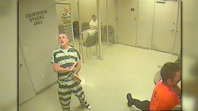 The inmates kept screaming for help and started banging on doors in a desperate bid to get someone down to the cell. (Screen grab from USA Today video) The inmates kept screaming for help and started banging on doors in a desperate bid to get someone down to the cell. (Screen grab from USA Today video)