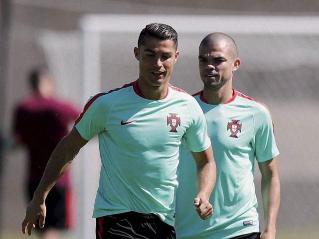 Portugal's Christiano Ronaldo, left, Ricardo Quaresma, right, and Pepe during training. (AP) Portugal's Christiano Ronaldo, left, Ricardo Quaresma, right, and Pepe during training. (AP)