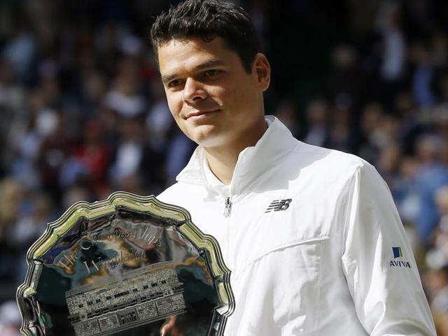 Milos Raonic of Canada holds his runner's up trophy after being beaten by Andy Murray of Britain in the men's singles final on day fourteen of the Wimbledon Tennis Championships in London. (AP Photo) Milos Raonic of Canada holds his runner's up trophy after being beaten by Andy Murray of Britain in the men's singles final on day fourteen of the Wimbledon Tennis Championships in London. (AP Photo)