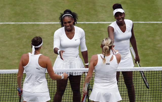 Venus Williams, top left, and Serena Williams of the US shake hands with Timea Babos of Hungary, bottom left, and Yaroslava Shvedova of Kazahkstan after beating them in the women's doubles final. (AP Photo) Venus Williams, top left, and Serena Williams of the US shake hands with Timea Babos of Hungary, bottom left, and Yaroslava Shvedova of Kazahkstan after beating them in the women's doubles final. (AP Photo)