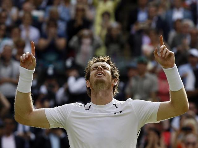 Murray looks up to the skies in celebration. (AP)