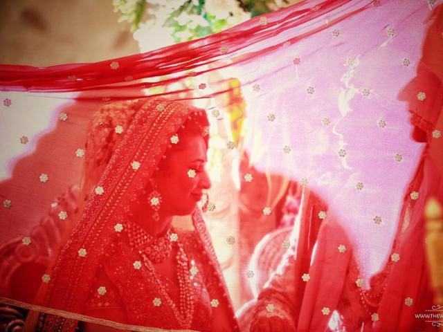 Divyanka and Vivek during the wedding ceremony. (Facebook/TheWeddingStory)