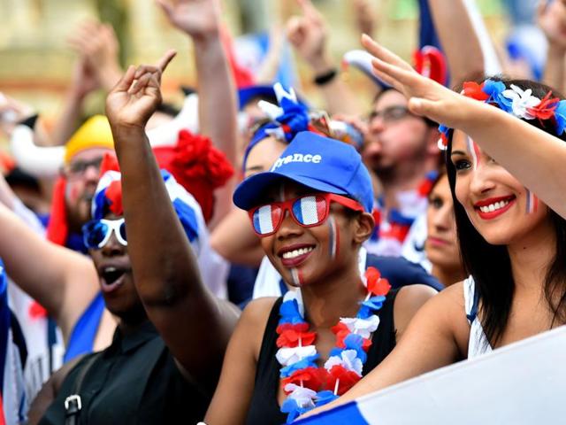 France supporters cheer trendy glasses and flower crowns. (AFP PHOTO) France supporters cheer trendy glasses and flower crowns. (AFP PHOTO)
