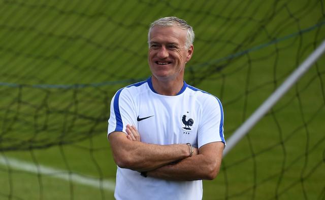 France's coach Didier Deschamps attends a training session in Clairefontaine-en-Yvelines. (AFP Photo) France's coach Didier Deschamps attends a training session in Clairefontaine-en-Yvelines. (AFP Photo)