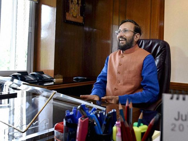 New HRD Minister Prakash Javadekar takes charge of his office in New Delhi on Thursday. (PTI) New HRD Minister Prakash Javadekar takes charge of his office in New Delhi on Thursday. (PTI)