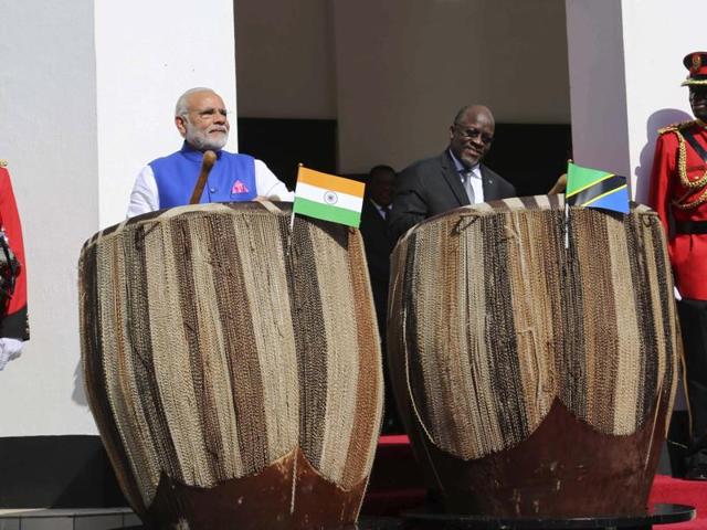 Prime Minister Narendra Modi and Tanzanian President John Pombe Magufuli play drums at the entrance of State House during an official welcome ceremony for Modi in Dar es Salaam, Tanzania , on Sunday, July 10, 2016. (PTI) Prime Minister Narendra Modi and Tanzanian President John Pombe Magufuli play drums at the entrance of State House during an official welcome ceremony for Modi in Dar es Salaam, Tanzania , on Sunday, July 10, 2016. (PTI)