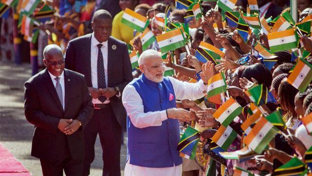Prime Minister Narendra Modi being greeted by members of the Indian community in Dar-es-Salaam, Tanzania. (PTI Photo) Prime Minister Narendra Modi being greeted by members of the Indian community in Dar-es-Salaam, Tanzania. (PTI Photo)