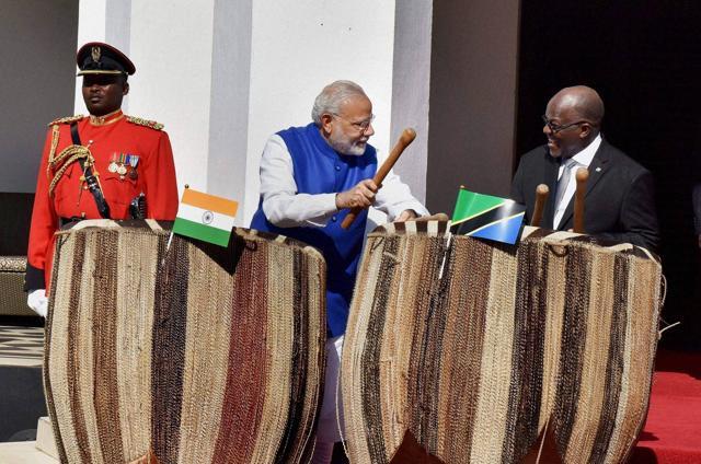Prime Minister Narendra Modi with Tanzanian president John Magufuli in Dar-es-Salaam on Sunday. (PTI Photo) Prime Minister Narendra Modi with Tanzanian president John Magufuli in Dar-es-Salaam on Sunday. (PTI Photo)
