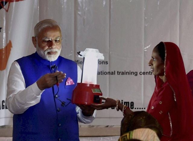 Prime Minister Narendra Modi during a visit to Barefoot College and ‘Solar Mamas’ of Africa, in Dar-es-Salaam, Tanzania. (PTI Photo) Prime Minister Narendra Modi during a visit to Barefoot College and ‘Solar Mamas’ of Africa, in Dar-es-Salaam, Tanzania. (PTI Photo)