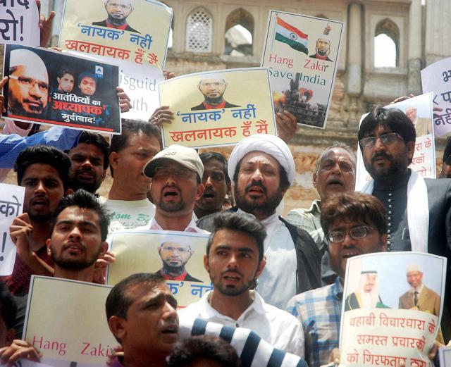 Activists of the Shia National Front protest against Zakir Naik in Lucknow on Saturday. (PTI) Activists of the Shia National Front protest against Zakir Naik in Lucknow on Saturday. (PTI)