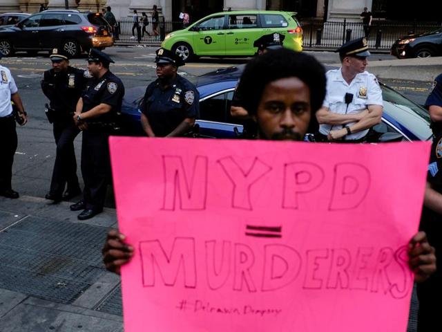 People shout slogans during a protest in support of the ‘Black Lives Matter’ movement in New York. (AFP) People shout slogans during a protest in support of the ‘Black Lives Matter’ movement in New York. (AFP)