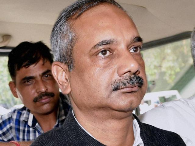 CBI officials bring Rajendra Kumar to the Patiala House court, in New Delhi on Sunday. (PTI) CBI officials bring Rajendra Kumar to the Patiala House court, in New Delhi on Sunday. (PTI)