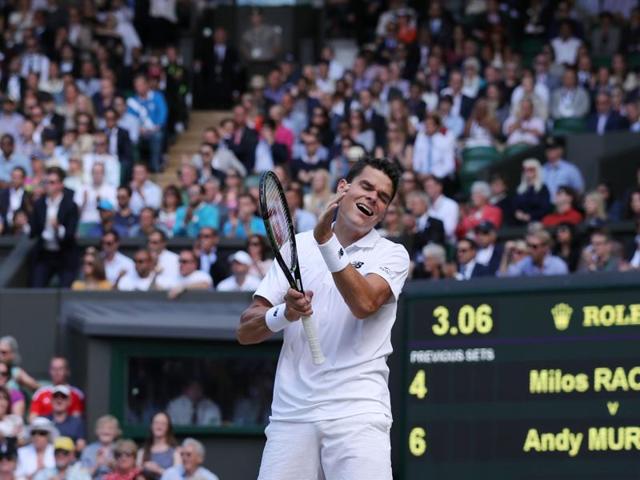 Raonic reacts sarcastically after losing a point. (AFP)