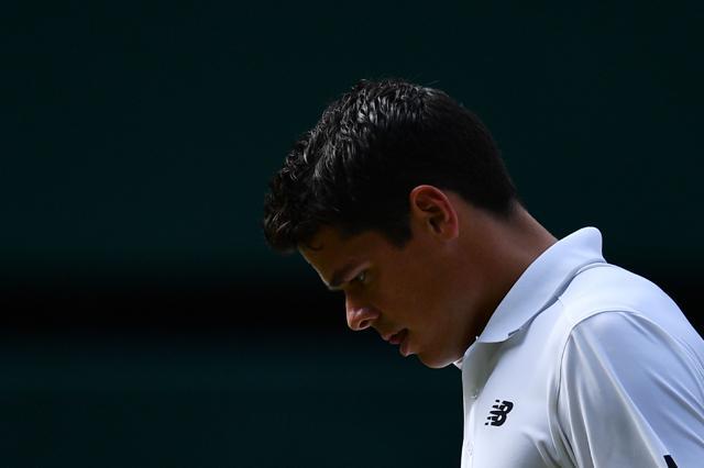 Canada's Milos Raonic looks downward while playing Britain's Andy Murray during the men's singles final. (AFP Photo) Canada's Milos Raonic looks downward while playing Britain's Andy Murray during the men's singles final. (AFP Photo)