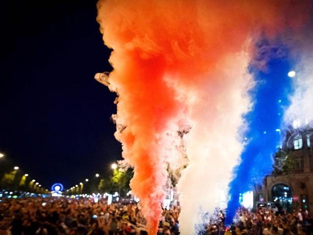 France supporters celebrate with smoke flares . (AFP PHOTO) France supporters celebrate with smoke flares . (AFP PHOTO)