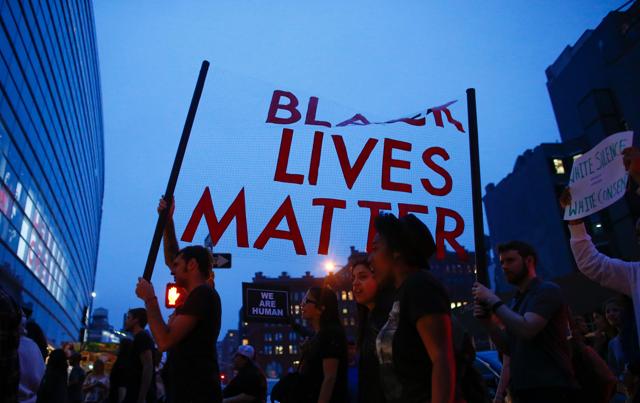 People shout slogans during a protest in support of the ‘Black Lives Matter’ movement in New York. (AFP) People shout slogans during a protest in support of the ‘Black Lives Matter’ movement in New York. (AFP)