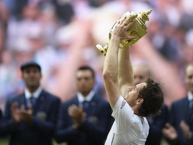 Murray hoists his trophy. (Reuters)