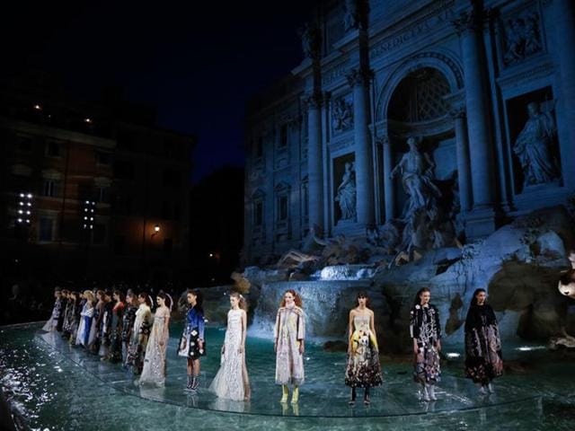 Glittering evening gowns with slits up the sides transformed their wearers into modern-day Hansel and Gretels, the reflection of lights scintillating in the turquoise waters echoing the shine of pebbles glinting in the moonlight in the fairytale. (AFP) Glittering evening gowns with slits up the sides transformed their wearers into modern-day Hansel and Gretels, the reflection of lights scintillating in the turquoise waters echoing the shine of pebbles glinting in the moonlight in the fairytale. (AFP)