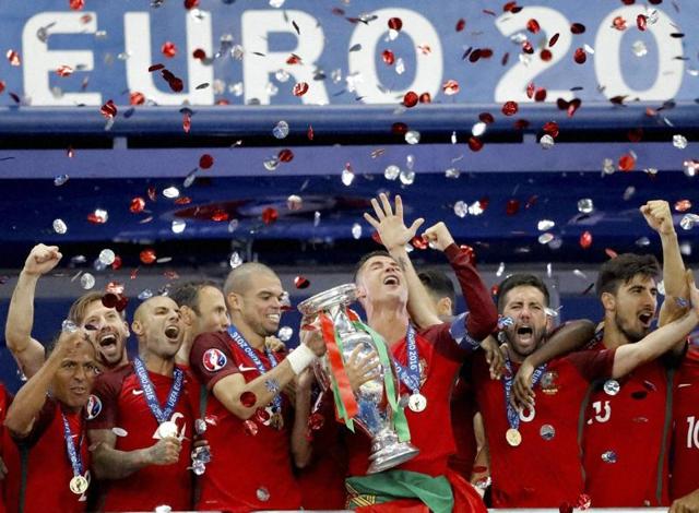 Portugal players lift the trophy after their 1-0 win over France in the Euro 2016 final. (AP) Portugal players lift the trophy after their 1-0 win over France in the Euro 2016 final. (AP)