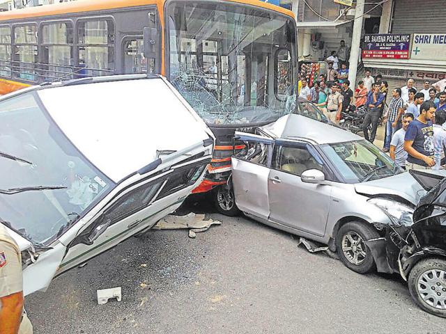 Four people were injured after 11 vehicles, including a cluster bus, piled-up in southwest Delhi’s Bijwasan near Kapashera on Monday morning. Four people were injured after 11 vehicles, including a cluster bus, piled-up in southwest Delhi’s Bijwasan near Kapashera on Monday morning.