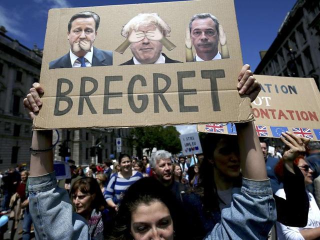 People hold banners during a 'March for Europe' demonstration against Brexit vote in central London on July 2, 2016. (Reuters file photo) People hold banners during a 'March for Europe' demonstration against Brexit vote in central London on July 2, 2016. (Reuters file photo)