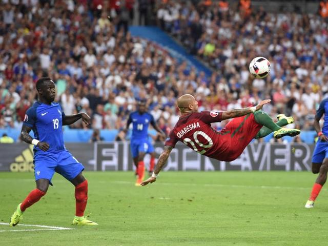 Portugal's forward Ricardo Quaresma (C) kicks the ball past France's defender Bacary Sagna (L) and France's midfielder Paul Pogba during the Euro 2016 final. (AFP Photo) Portugal's forward Ricardo Quaresma (C) kicks the ball past France's defender Bacary Sagna (L) and France's midfielder Paul Pogba during the Euro 2016 final. (AFP Photo)