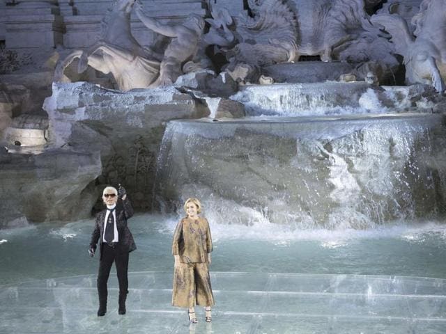As the models, including Americans Kendall Jenner and Bella Hadid, wound up their catwalk, designer Karl Largerfeld, wearing his trademark gloves, came out to take a bow along with the Italian house’s accessories designer Silvia Venturini Fendi. (AP) As the models, including Americans Kendall Jenner and Bella Hadid, wound up their catwalk, designer Karl Largerfeld, wearing his trademark gloves, came out to take a bow along with the Italian house’s accessories designer Silvia Venturini Fendi. (AP)