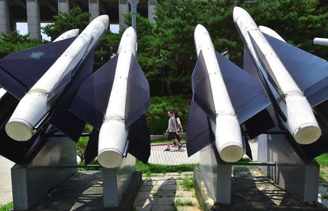 Visitors walk past replicas of South Korean Hawk surface-to-air missiles at the Korean War Memorial in Seoul on Friday. (AFP) Visitors walk past replicas of South Korean Hawk surface-to-air missiles at the Korean War Memorial in Seoul on Friday. (AFP)