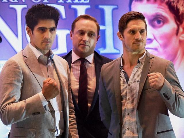 Indian boxer Vijender Singh and Australian boxer Kerry Hope (right) with Francis Warren. (PTI Photo) Indian boxer Vijender Singh and Australian boxer Kerry Hope (right) with Francis Warren. (PTI Photo)