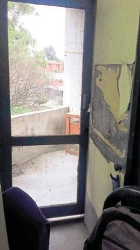 A broken door to the balcony of a room. (HT Photo)