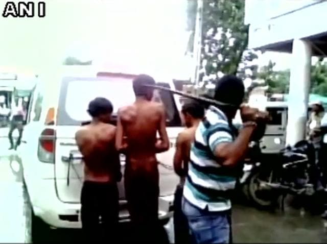 A video purportedly recorded by the attackers and shared online shows four Dalit men chained to a car and being beaten with iron rods.(Screenshot from video)